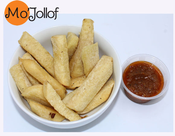 Fried yam with a side of dipping hot pepper sauce by Mo'Jollof.